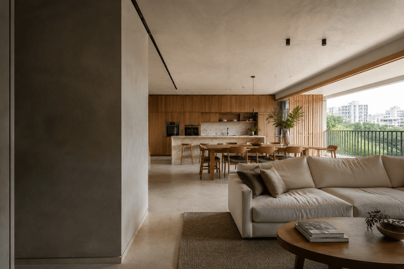 Interior residencial com sala, jantar e cozinha integrados